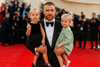 Tiny Hearts, Big Kisses: Elliotte & Wyatt’s Adorable Air-Kiss Ambush Melts Uncle Travis on New Heights! 💕🐘😘